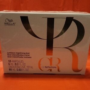 Wella Oil Reflections Elixir with Black and Gold Design